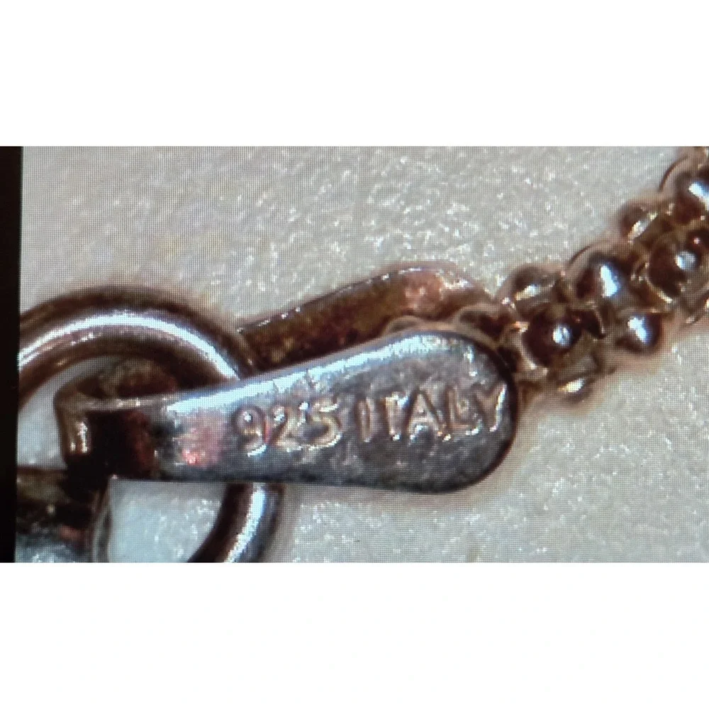 Vintage Sterling Silver Embossed Paw Print Pendant 17